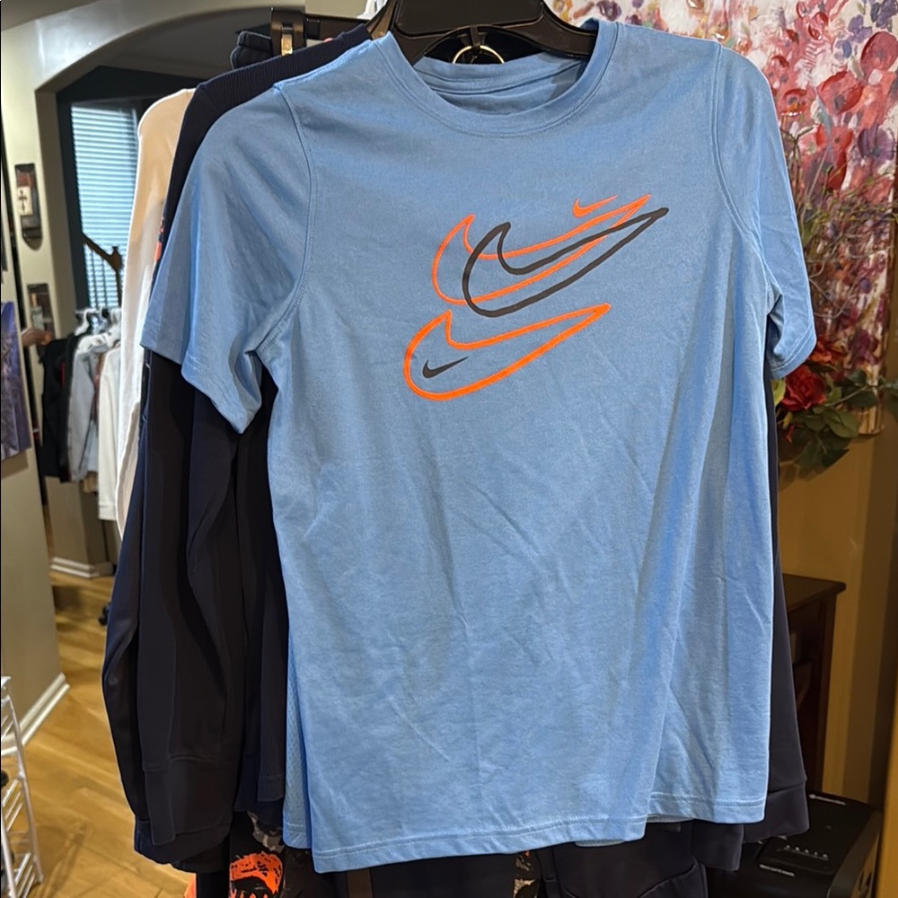 Nike Men's Light Blue Tee with Orange and Gray Logo